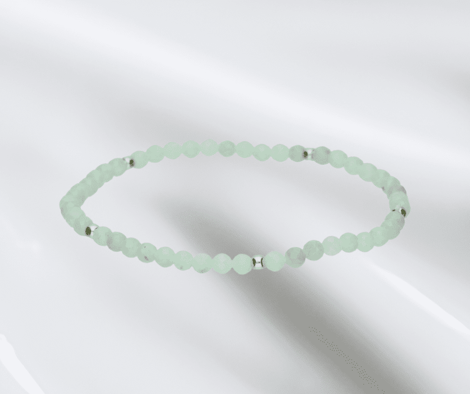 BRANSOLETA Z AŻUROWYM SKRZYDŁEM, ELEMENTY ZE SREBRA PRÓBY 925 SREBRZONEGO, WOSKOWANY SZNUREK JUBILERSKI W KOLORZE CZARNYM, DŁUGOŚĆ 16-17CM+3CM PRZEDŁUŻKA, WYMIARY SKRZYDEŁKA 23mm X 8mm.(8)